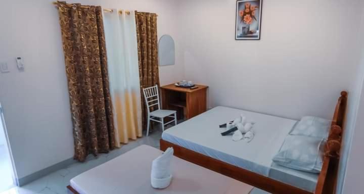 Elnora Delmar Travellers Inn Siquijor Bagian luar foto
